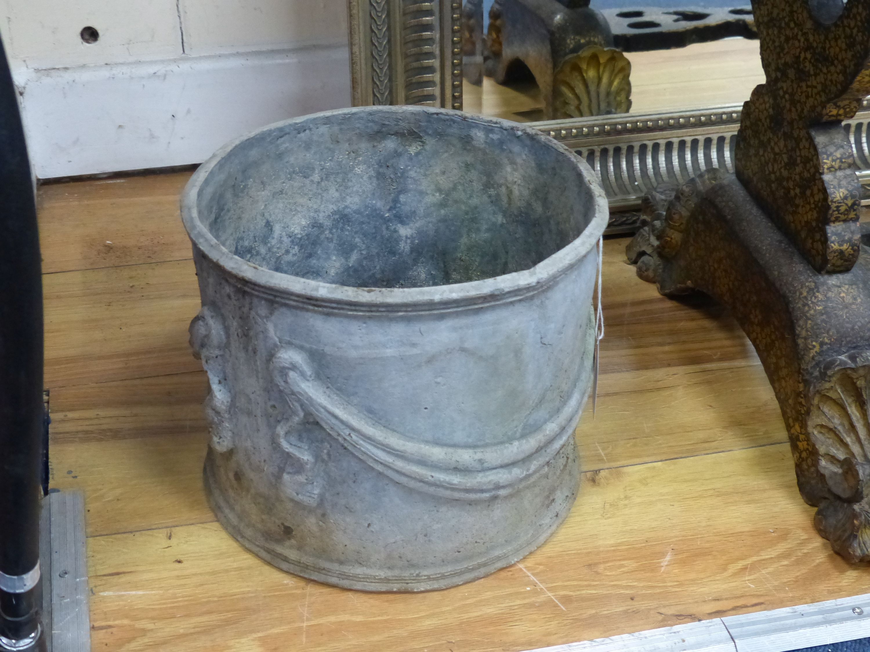 A pair of circular lead planters, diameter 23cm, height 20cm